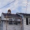 House needing a new roof.