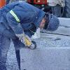 Dedicated craftman at work.  It is amazing what some good craftman can build.  I was hoping for some more sparks coming from the grinding of the stone.    