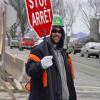 Happy young man directing the busy traffic on this Saturday morning.  